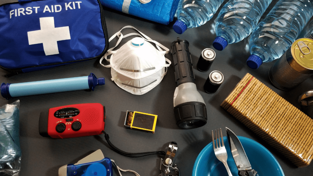 an assortment of first aid supplies laid out on a table