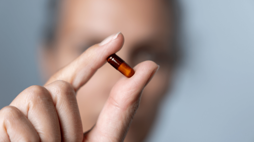 a close up of pills with a vitamin c label